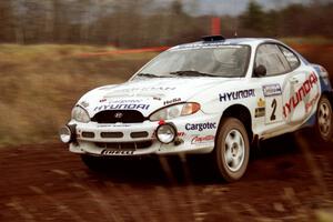 Noel Lawler / Charles Bradley Hyundai Tiburon at speed on the practice stage.