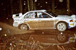 Karl Scheible / Gail McGuire Mitsubishi Lancer Evo V at speed on SS2, Bob Lake I.