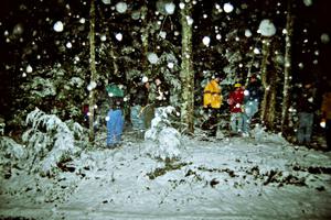 Spectators standing at the s-curve in the snow on SS8, Bob Lake II.