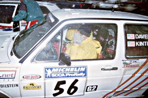 A shy Brenda Corneliusen tries to stay warm by hiding from the cameraman inside of the Doug Davenport / Al Kintigh VW GTI.