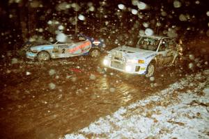 Karl Scheible / Gail McGuire Mitsubishi Lancer Evo V passes by the wrecked Noel Lawler / Charles Bradley Hyundai Tiburon on SS5.