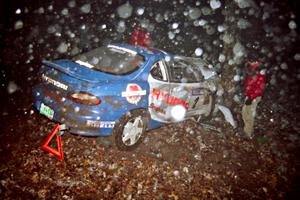 Noel Lawler / Charles Bradley Hyundai Tiburon crashed heavily into a tree at the flying finish of SS5, Passmore.