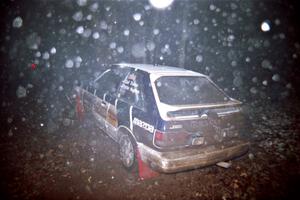 Gail Truess / Pattie Hughes Mazda 323GTX crashed heavily into a tree at the flying finish of SS5, Passmore.