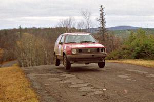 Richard Pilczuk / Brian Pilczuk VW GTI at the final yump on SS14, Brockway Mountain I.