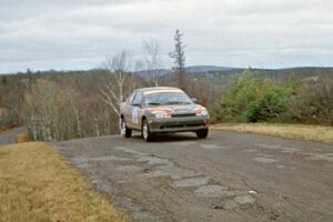 Evan Moen / Tom Young  Plymouth Neon ACR at the final yump on SS14, Brockway Mountain I.