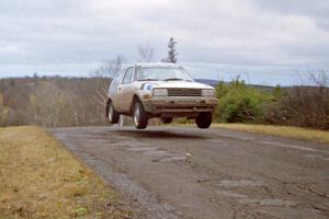 Eric Burmeister / Mark Buskirk VW GTI at the final yump on SS14, Brockway Mountain I.