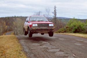 Brian Vinson / Richard Beels VW GTI at the final yump on SS14, Brockway Mountain I.