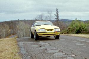 Don Rathgeber / D.J. Bodnar Ford Mustang at the final yump on SS14, Brockway Mountain I.