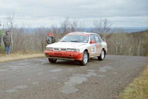 Arthur Wojcik / Chuck Cox Mitsubishi Galant VR-4 at the final yump on SS14, Brockway Mountain I.