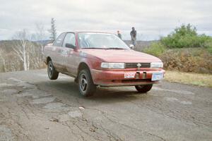 Eric Seppanen / Emily Burton-Weinman Nissan Sentra SE-R at the final yump on SS14, Brockway Mountain I.