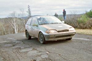 Pete Beaupre / Dave Cizmas Suzuki Swift at the final yump on SS14, Brockway Mountain I.