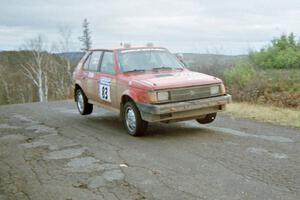 Mark Utecht / Diane Sargent Dodge Omni GLH-Turbo at the final yump on SS15, Brockway Mountain II.