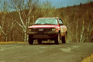 Jon Kemp / Rod Hendricksen Audi 4000 Quattro at the final yump on SS14, Brockway Mountain I.