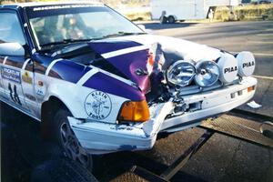 Gail Truess / Pattie Hughes Mazda 323GTX on the trailer after the rally