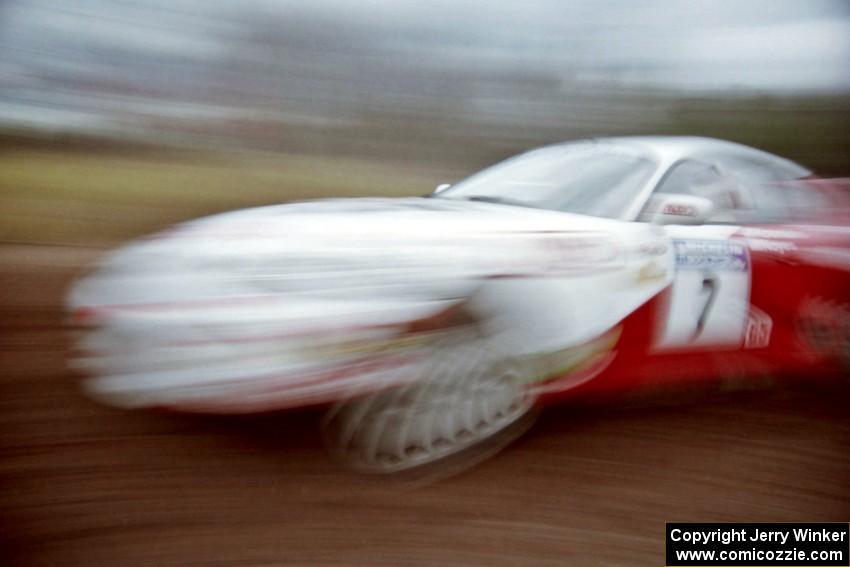 Ralph Kosmides / Joe Noyes Toyota Supra Turbo at speed on the practice stage.