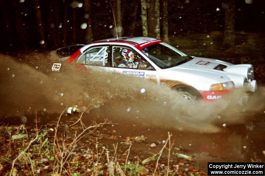 Garen Shrader / Doc Schrader Mitsubishi Lancer Evo IV at speed on SS2, Bob Lake I.