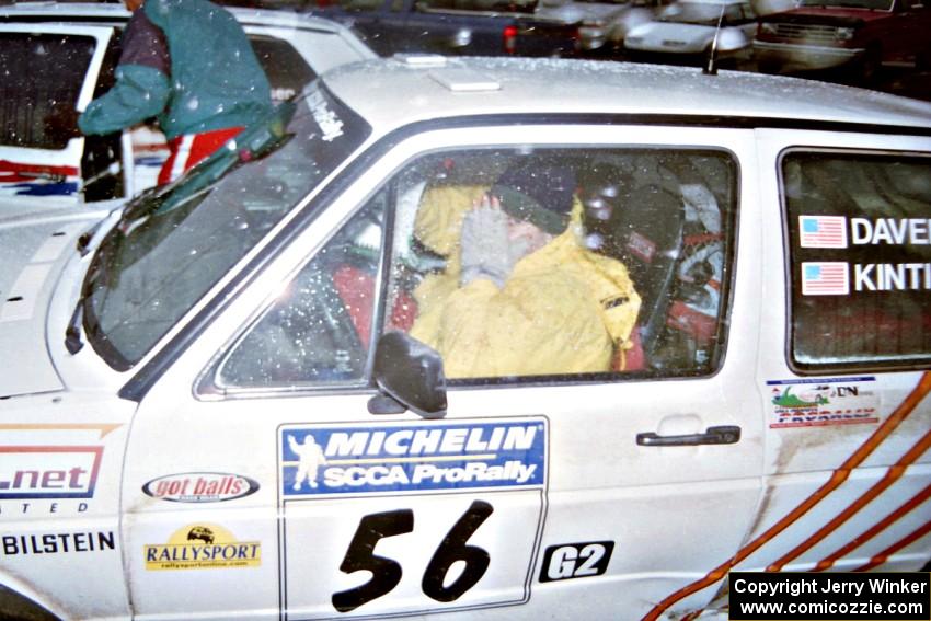 A shy Brenda Corneliusen tries to stay warm by hiding from the cameraman inside of the Doug Davenport / Al Kintigh VW GTI.