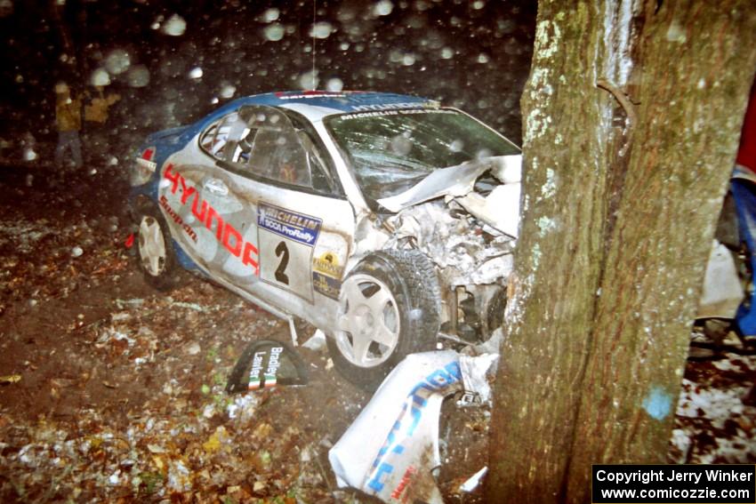 Noel Lawler / Charles Bradley Hyundai Tiburon crashed heavily into a tree at the flying finish of SS5, Passmore.