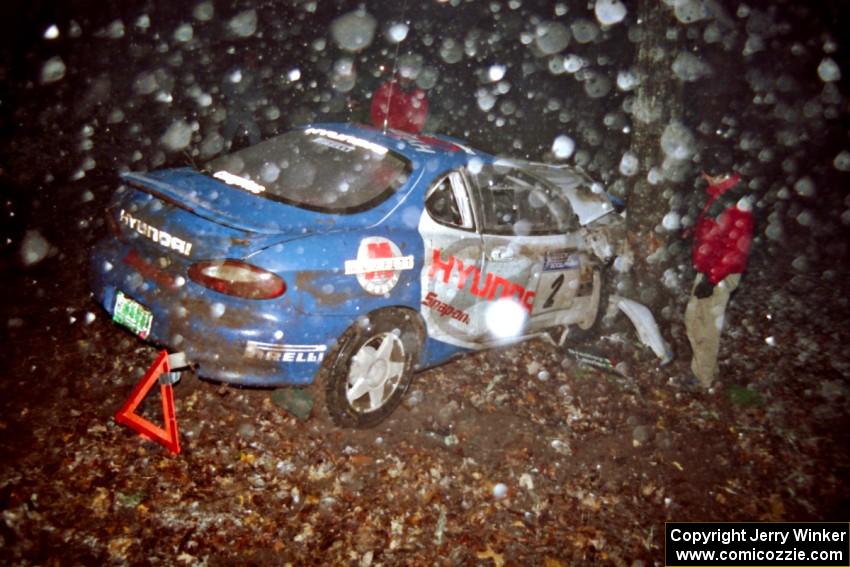 Noel Lawler / Charles Bradley Hyundai Tiburon crashed heavily into a tree at the flying finish of SS5, Passmore.
