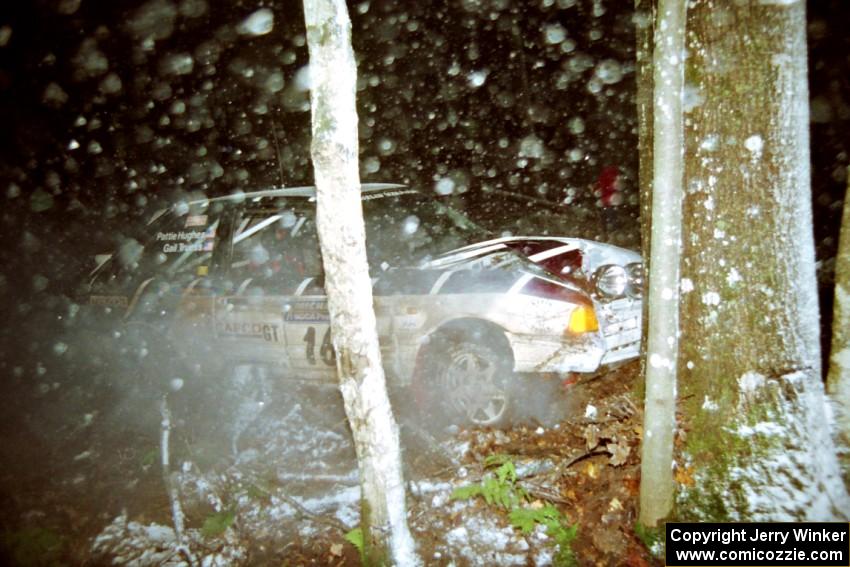 Gail Truess / Pattie Hughes Mazda 323GTX crashed heavily into a tree at the flying finish of SS5, Passmore.