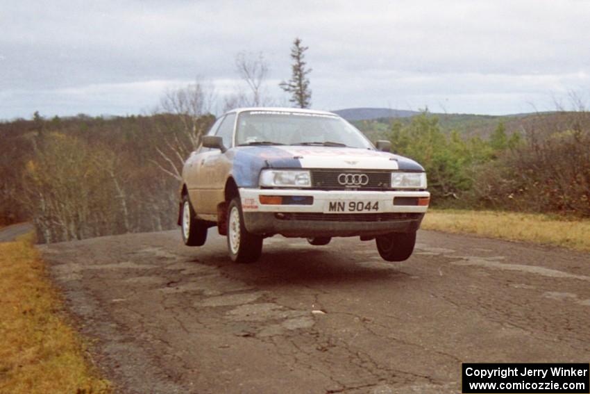 Alex Erisoty / Ben Greisler Audi 90 Quattro at the final yump on SS14, Brockway Mountain I.