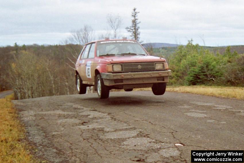 Mark Utecht / Diane Sargent Dodge Omni GLH-Turbo at the final yump on SS14, Brockway Mountain I.