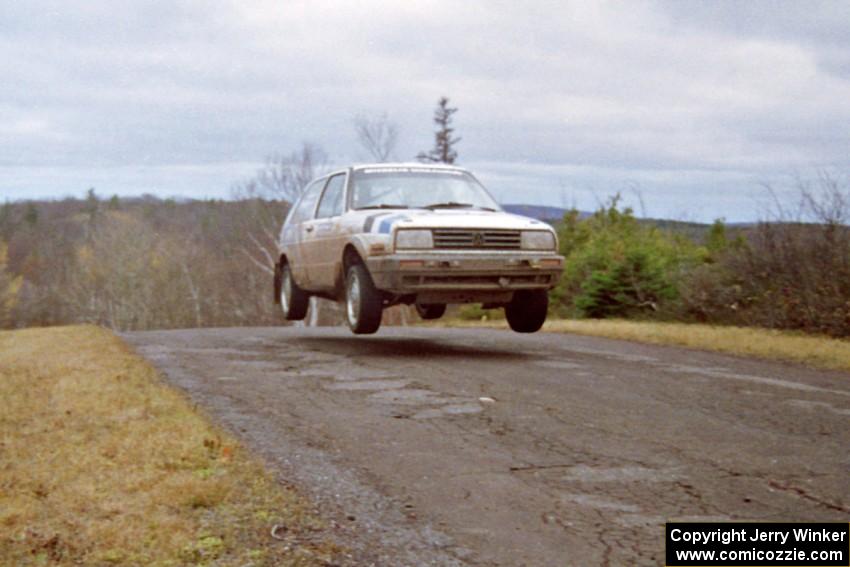 Eric Burmeister / Mark Buskirk VW GTI at the final yump on SS14, Brockway Mountain I.