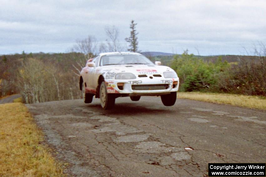 Ralph Kosmides / Joe Noyes Toyota Supra Turbo at the final yump on SS14, Brockway Mountain I.