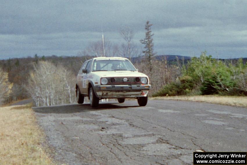 Doug Davenport / Al Kintigh VW GTI at the final yump on SS14, Brockway Mountain I.