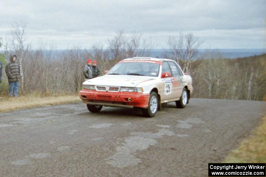 Arthur Wojcik / Chuck Cox Mitsubishi Galant VR-4 at the final yump on SS14, Brockway Mountain I.