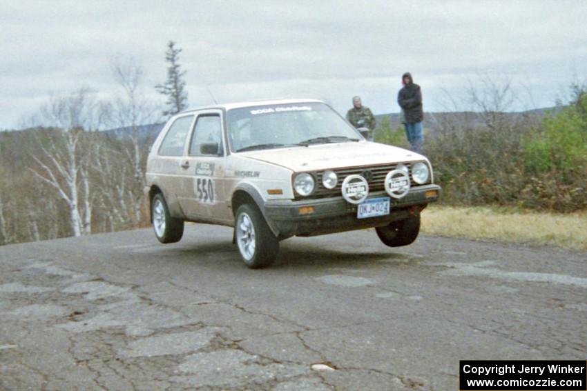 Aaron Hatz / Brendan Higgins VW GTI at the final yump on SS14, Brockway Mountain I.