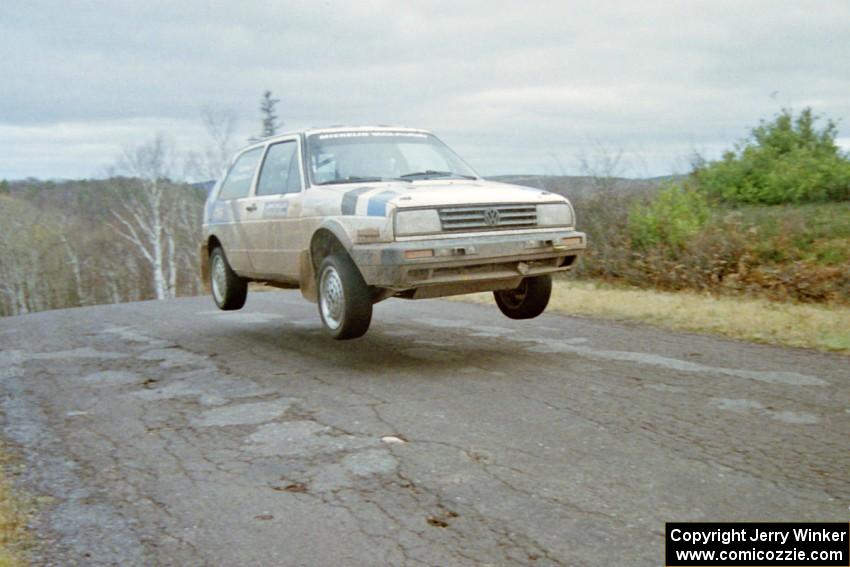 Eric Burmeister / Mark Buskirk VW GTI at the final yump on SS15, Brockway Mountain II.