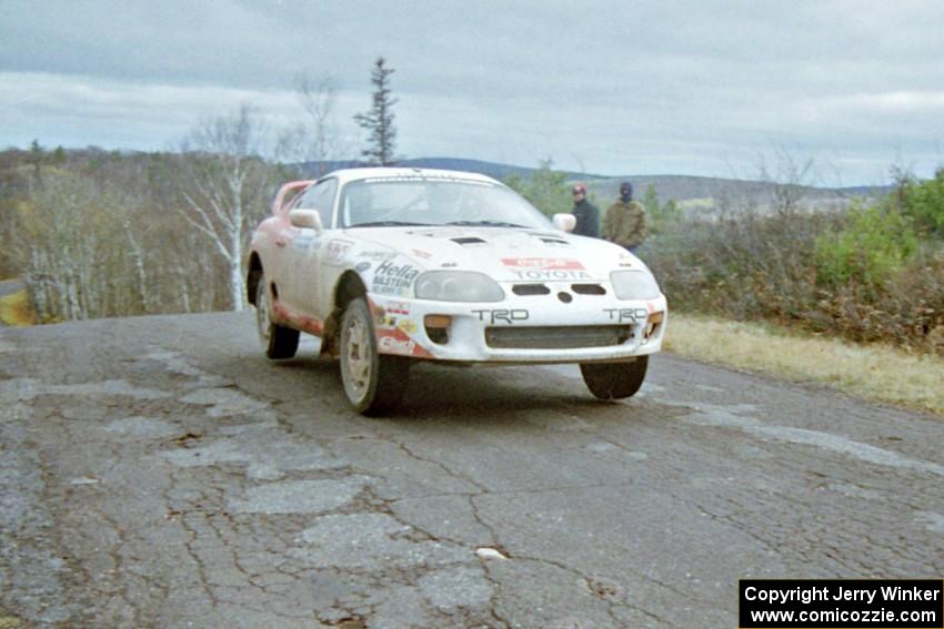 Ralph Kosmides / Joe Noyes Toyota Supra Turbo at the final yump on SS15, Brockway Mountain II.