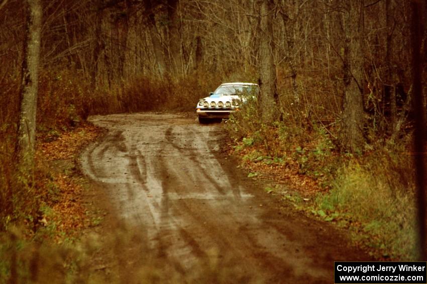 Mike Hurst / Rob Bohn Mazda RX-7 slide wide on SS18, Gratiot Lake II.