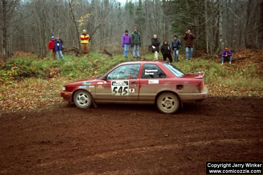 Eric Seppanen / Emily Burton-Weinman Nissan Sentra SE-R at the first turn of SS18, Gratiot Lake II.