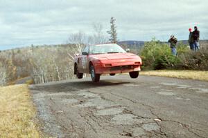 Chris Gilligan / Joe Petersen Toyota MR-2 at the final yump on SS14, Brockway Mountain I.