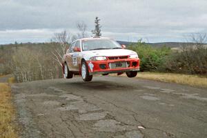 Henry Joy IV / Chris Griffin Mitsubishi Lancer Evo II at the final yump on SS15, Brockway Mountain II.