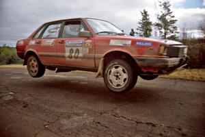 Jon Kemp / Rod Hendricksen Audi 4000 Quattro at the final yump on SS15, Brockway Mountain II.