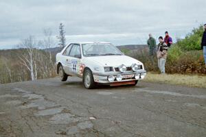 Henry Krolikowski / Cindy Krolikowski Dodge Shadow at the final yump on SS15, Brockway Mountain II.