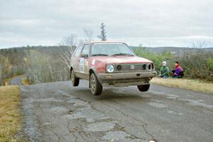 Richard Pilczuk / Brian Pilczuk VW GTI at the final yump on SS15, Brockway Mountain II.