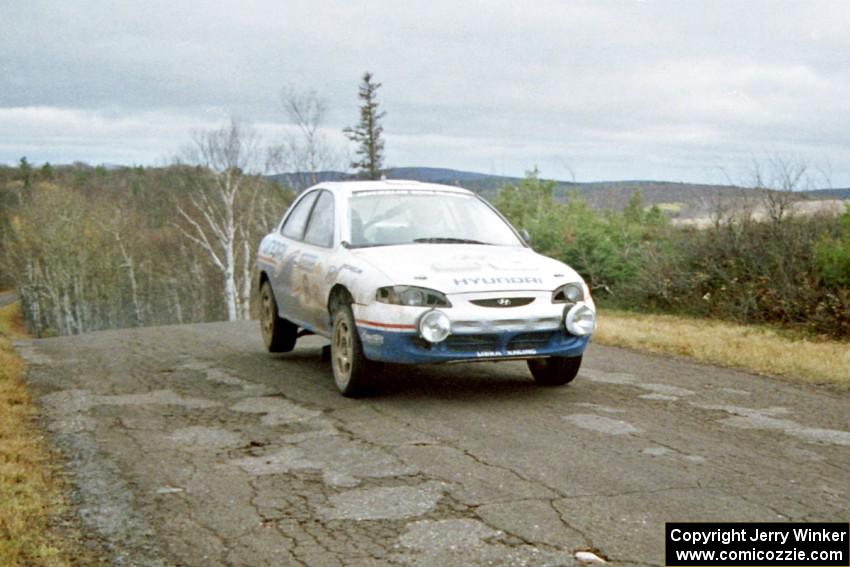 John Buffum / Lance Smith Hyundai Elantra at the final yump on SS15, Brockway Mountain II.