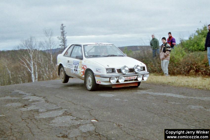 Henry Krolikowski / Cindy Krolikowski Dodge Shadow at the final yump on SS15, Brockway Mountain II.