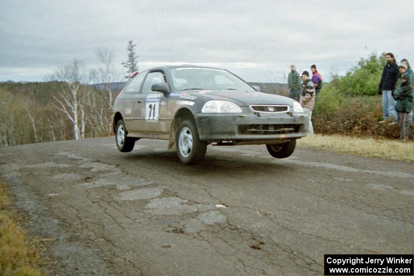 Bryan Hourt / Pete Cardimen Honda Civic at the final yump on SS15, Brockway Mountain II.