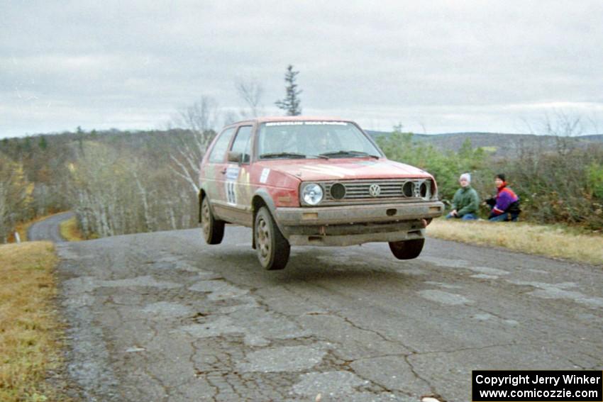 Richard Pilczuk / Brian Pilczuk VW GTI at the final yump on SS15, Brockway Mountain II.