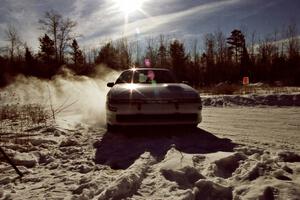 Chris Czyzio / Eric Carlson drift their Mitsubishi Eclips GSX on the spectator corner on SS1, Hungry 5.