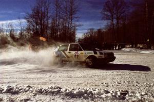 The Eric Burmeister / Mark Buskirk VW GTI drifts past spectators on SS1, Hungry 5.