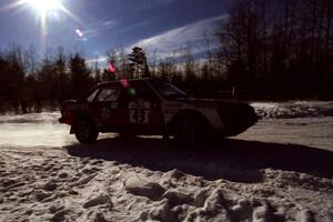 Carlos Arrieta, Sr. / Dick Casey drift past spectators on SS1, Hungry 5, in their Audi 4000 Quattro.