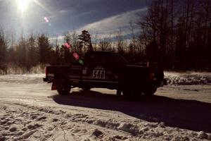 Scott Carlborn / Dale Dewald drive past spectators on SS1, Hungry 5, in their Jeep Comanche.