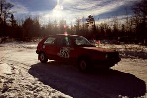 The Josh Scott / Roxanne Slancik VW GTI drifts past spectators on SS1, Hungry 5.