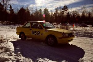 The Bruce Eddy / Jeff Shields Nissan Sentra SE-R drifts past spectators on SS1, Hungry 5.